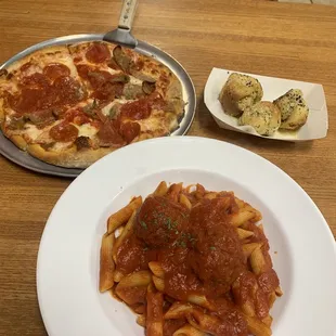 Penne with meatballs, pepperoni and sausage pizza, garlic knots.