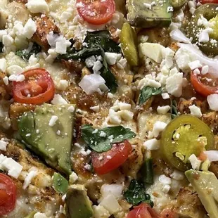 Chicken taco pizza with jalapeños