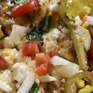 Chicken taco pizza with jalapeños