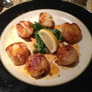 Broiled sea scallops in white wine and lemon. Perfection!