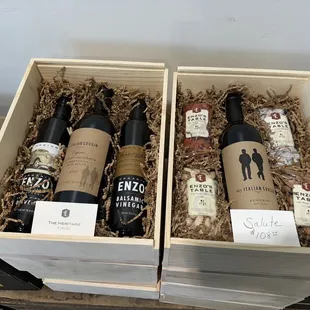 three bottles of wine in a wooden box