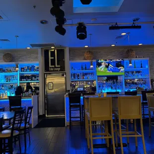 a bar with blue lighting