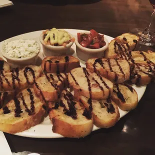 Love that they give you three or five options of dipping for your bruschetta. The salmon tartare is a salt lovers dream! Best in Orlando.