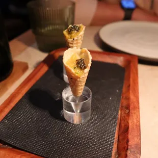 Complimentary citrus and caviar bite
