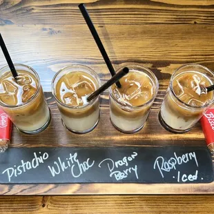 Coffee Flight: Pistachio, White Chocolate, Dragon Berry, and Raspberry Iced