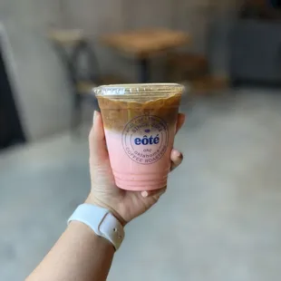 Iced latte w/ raspberry syrup