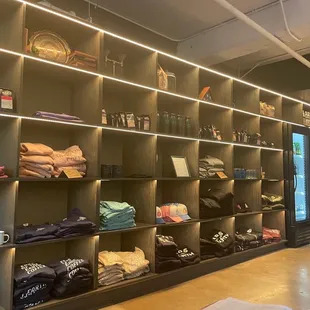 a large display of clothing in a store