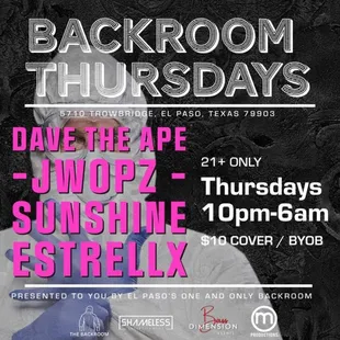 a man in a white shirt and blue gloves