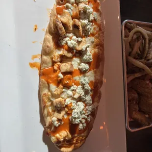 a chicken sandwich with blue cheese