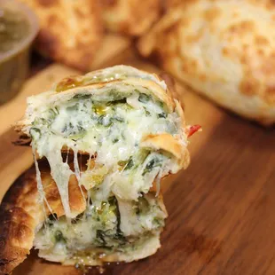 a close up of a piece of pizza