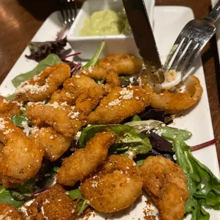 Bread dough.  Oh yeah there is calamari hidden there.  Good luck.