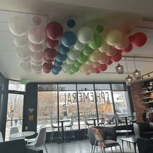 Paper lanterns adorn the ceiling