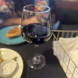 a glass of red wine