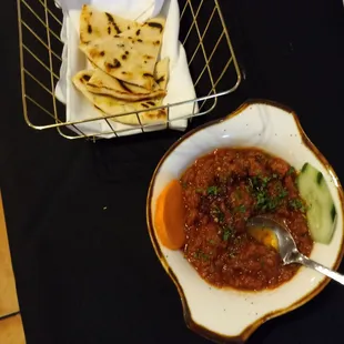 Spicy Ezme - Mixed vegetables chopped, blended with pepper paste, pomegranate, molasses &amp; olive oil - $6.95  Pita - $1