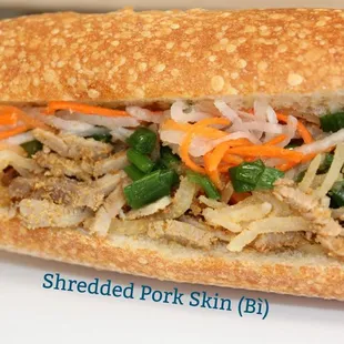 a sandwich with meat and vegetables