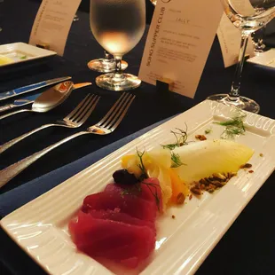 Maguro tuna, pistachio oil, cured olives, pickled fennel, pistachio crumble, blood orange.