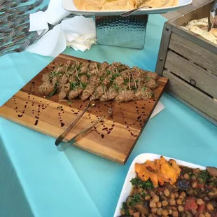 Lamb and mint kabobs w/ pomegranite molasses and black garlic tahini