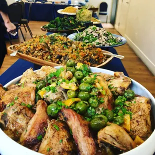 Chicken thighs braised with preserved lemons, olives and fennel.