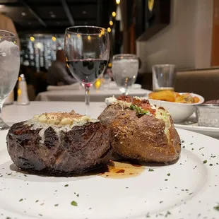 Filet Mignon, roasted garlic brie butter, loaded potato