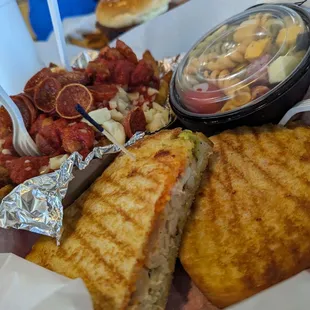 The smoking pipe with Italian pasta salad, and pizza poutine