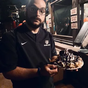 Cookies n cream funnel cake with ice cream. Go all out - you&apos;re on vacation!