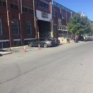 Street entrance with valet parking.