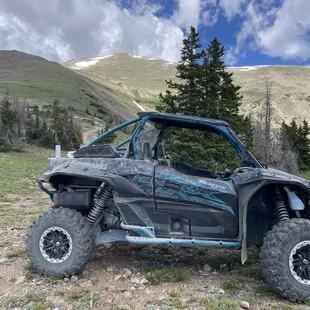 2 seater in front of the Rockies