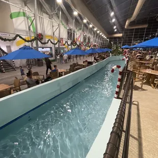 Lazy river, view of food stand and arcade