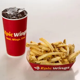 fries and a drink on a table