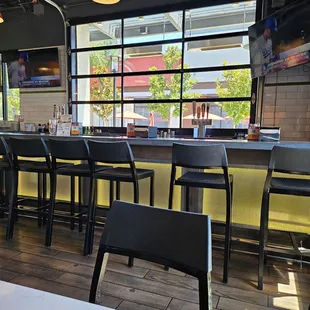 a view of the bar and seating area
