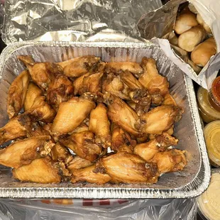 40 for $40 Chicken Wings no sauce. Garlic Parmesan on side. 6 Bread Sticks $4. Atomic sauce $.82.