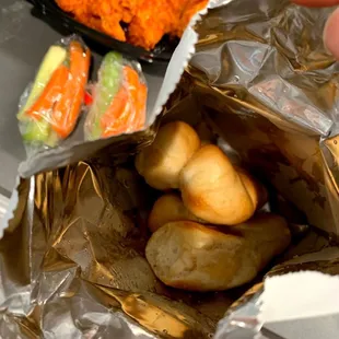 Breadsticks and one pack carrots/celery that come with a meal