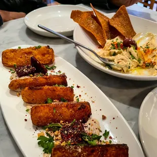 Appetizers: Hummus and Squash plates.