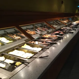 a buffet with a variety of food items