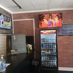 a fridge and televisions