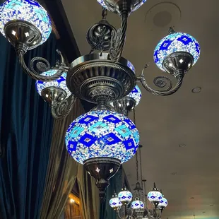 a chandelier with blue and white lights