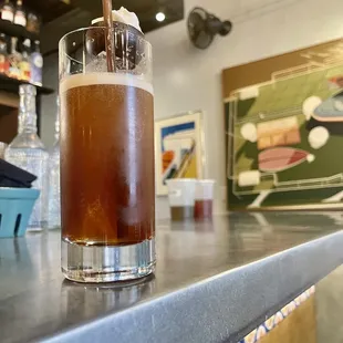 a drink on a bar counter