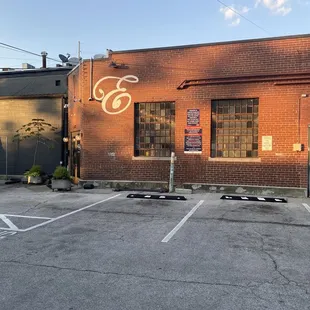 Outside of Epiphany. You can see there's some parking and a patio area to the left in the picture