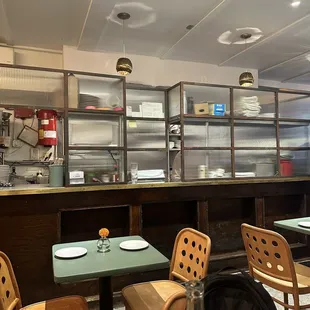 a restaurant with tables and chairs