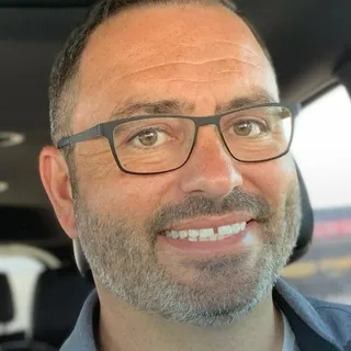 Dennis T.