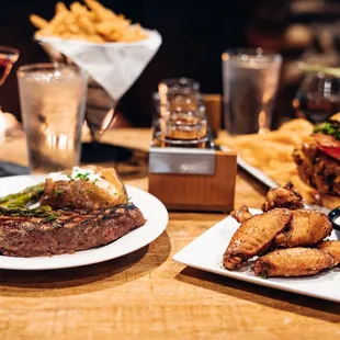 a steak and fries on a table