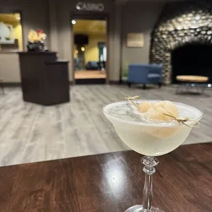 a cocktail in a glass on a table