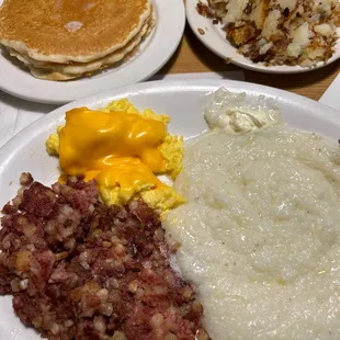 Eggs  with Corned Beef Hash and Grits. A Chicago favorite.