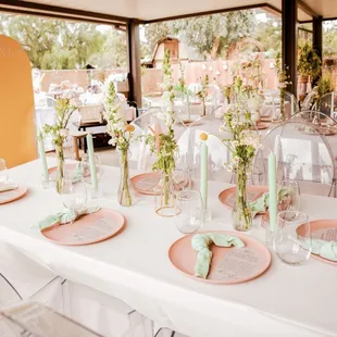 ghost chairs with pink decoration