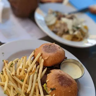 a plate of french fries and a burger