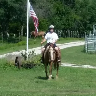 Grandson out on his first solo ride. He and our good mare, Dunny, did a fine job.