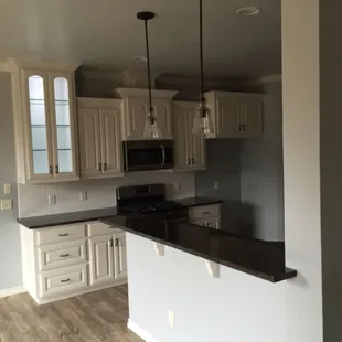 Put LED lights in customer cabinet with glad doors.m