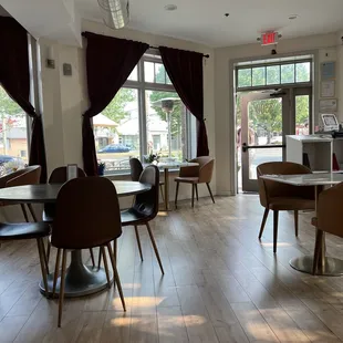 tables and chairs in a wine bar