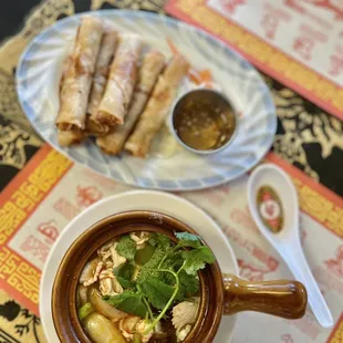 a bowl of soup and a plate of food
