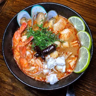 a bowl of shrimp and clams